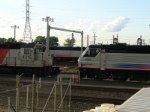 Changing of the guard. A  NJT GP40PH-2B and a PL42AC  stare each other down.